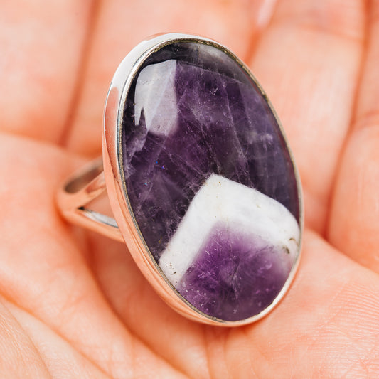 Oval amethyst cabochon ring with white veining, .925 sterling silver bezel and band