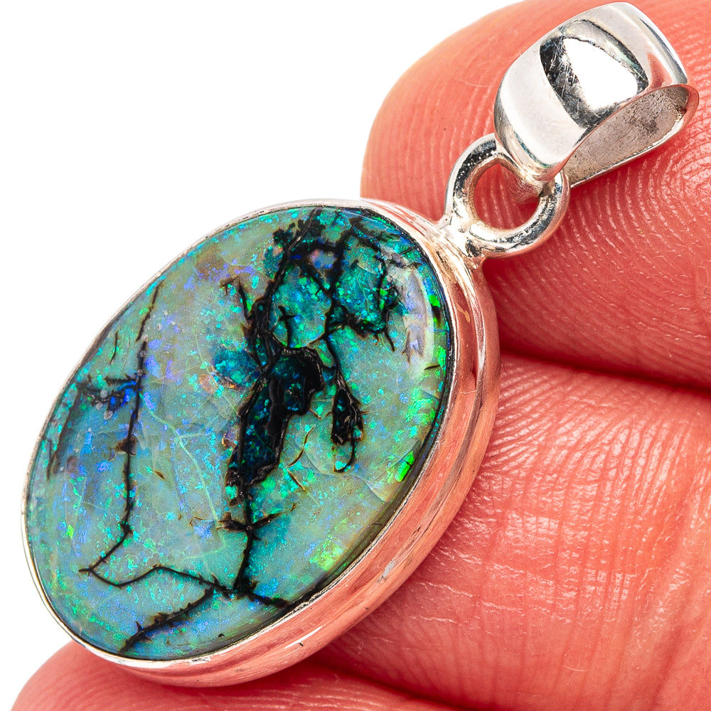 Sterling silver opal pendant with oval turquoise-blue stone in bezel