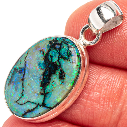 Sterling silver opal pendant with oval turquoise-blue stone in bezel