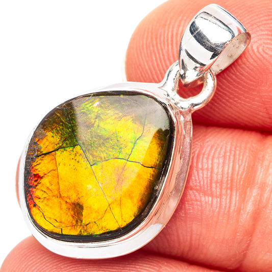 Sterling silver ammolite pendant with oval iridescent yellow-green stone in bezel