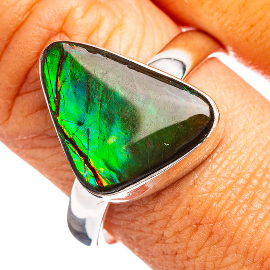 Sterling silver ring with green iridescent ammolite teardrop stone, size 10