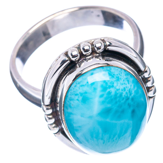 Larimar gemstone ring with oval turquoise stone and silver bezel setting