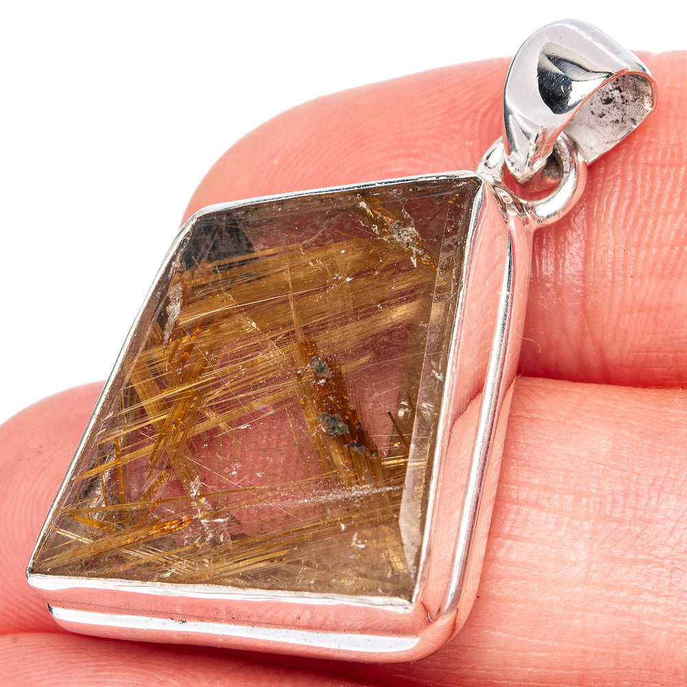 Triangular sterling silver rutile pendant, golden needle inclusions in faceted stone