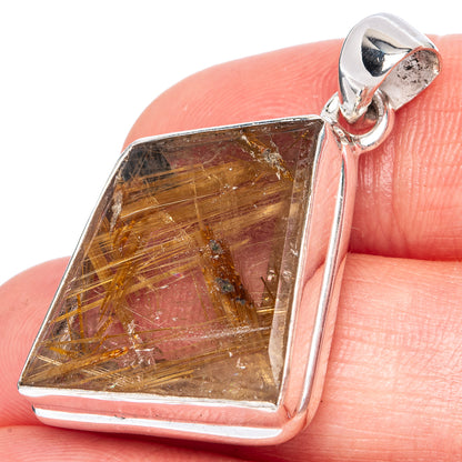 Triangular sterling silver rutile pendant, golden needle inclusions in faceted stone