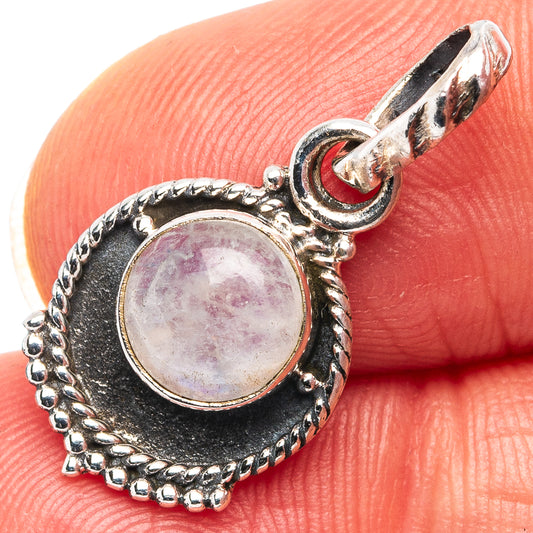 Sterling silver moonstone pendant with pink-tinged oval cabochon and beaded edge