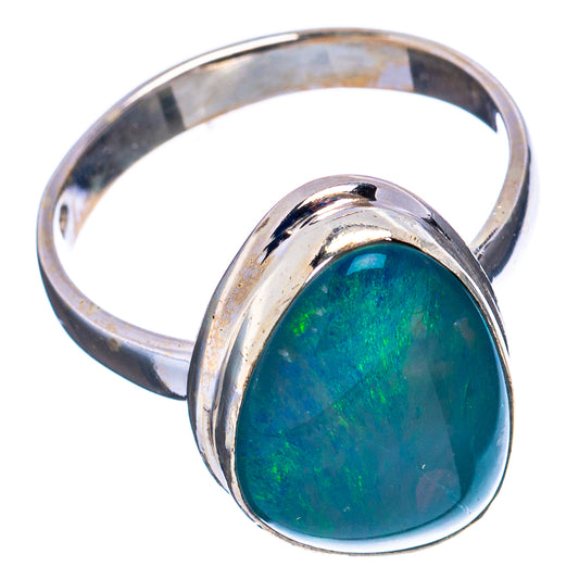 Sterling silver opal cabochon ring with teal-green stone, rounded bezel and band