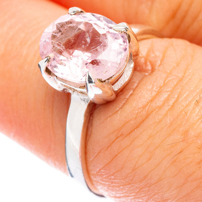 Sterling silver ring with large faceted pink morganite oval stone, prong setting