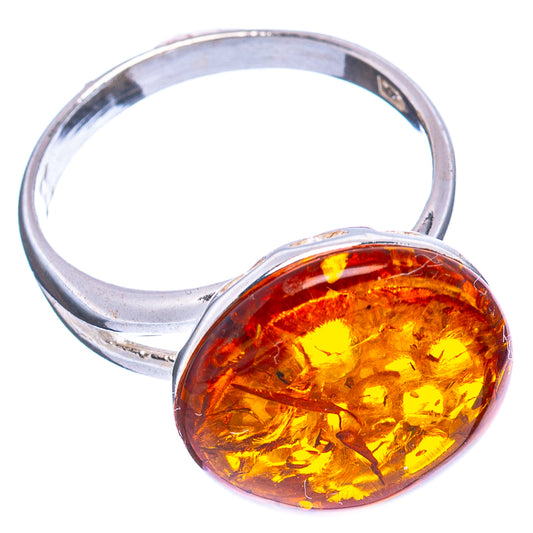 Silver amber ring with oval natural Baltic amber cabochon, polished band