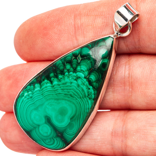 Teardrop malachite pendant with .925 sterling silver bail and green banded stone