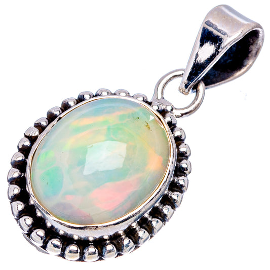 Oval opal cabochon sterling silver pendant with beaded border and loop bail