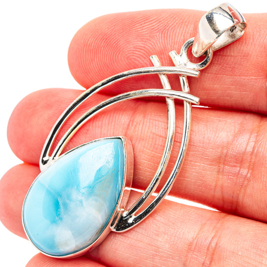 Larimar teardrop pendant with bright blue stone and three sterling silver ring hoops