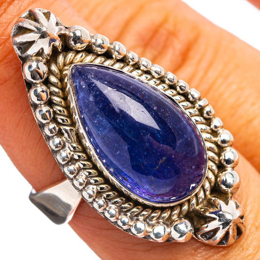 Tanzanite ring in .925 sterling silver with oval deep blue gemstone, ornate raised bezel