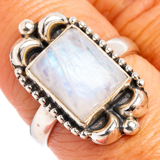 Sterling silver moonstone ring with rectangular opal-like stone and beaded bezel