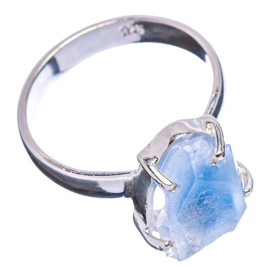Sterling silver ring with faceted sky-blue quartz shard and claw prong setting
