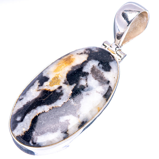 Oval jasper pendant with silver bezel and top bail; black, white, gold speckled stone