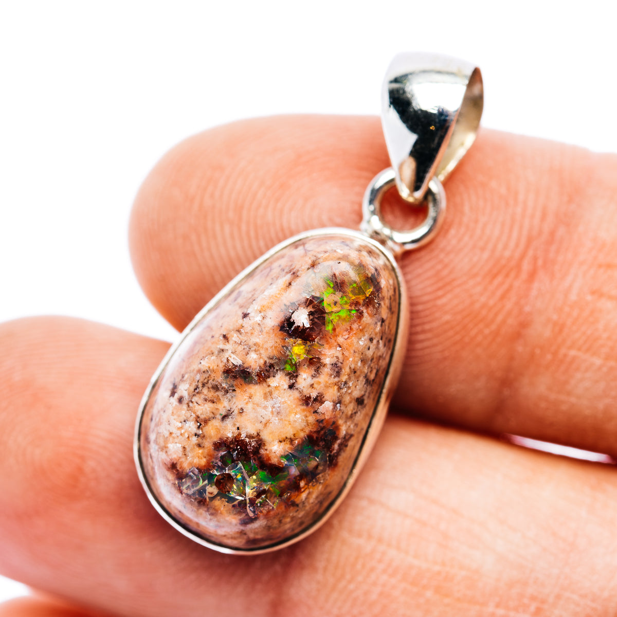 Oval fire opal pendant in .925 sterling silver with silver bezel and loop bail