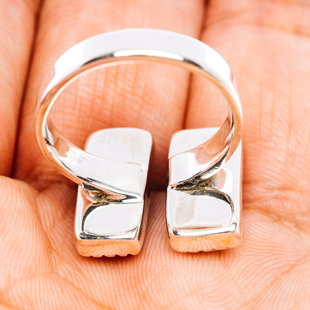 Sterling silver adjustable ring band with polished rectangular bezel setting