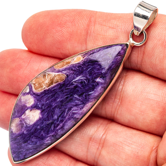 Charoite pendant in teardrop shape with purple stone and sterling silver bail