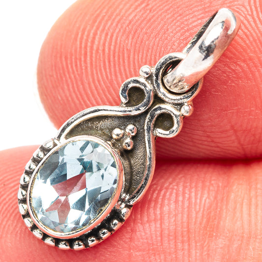 Blue topaz teardrop pendant, .925 sterling silver with ornate oval stone bezel