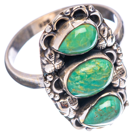 Sterling silver ring with three oval green-blue turquoise cabochons and decorative side details