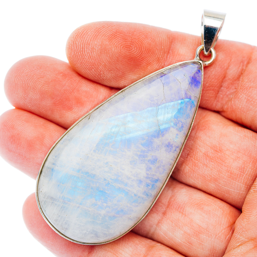 Large rainbow moonstone teardrop pendant in .925 sterling silver bezel, blue opal glow