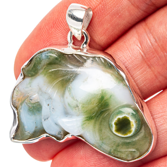 Ocean jasper pendant in .925 sterling silver, irregular cabochon with green-blue swirls