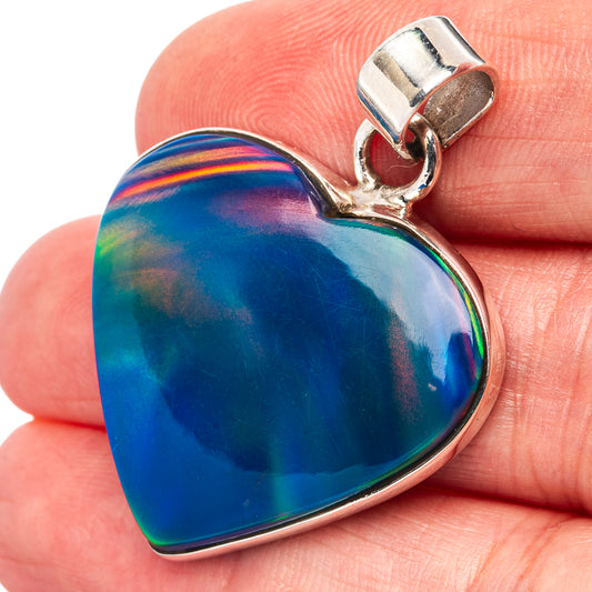 Heart-shaped blue opal pendant with rainbow shimmer, .925 sterling silver bail