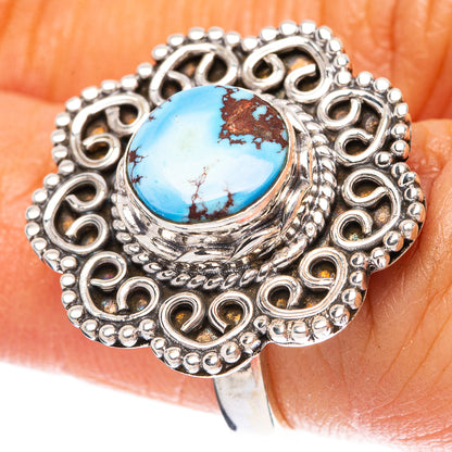 Turquoise cabochon sterling silver ring with ornate oval filigree setting