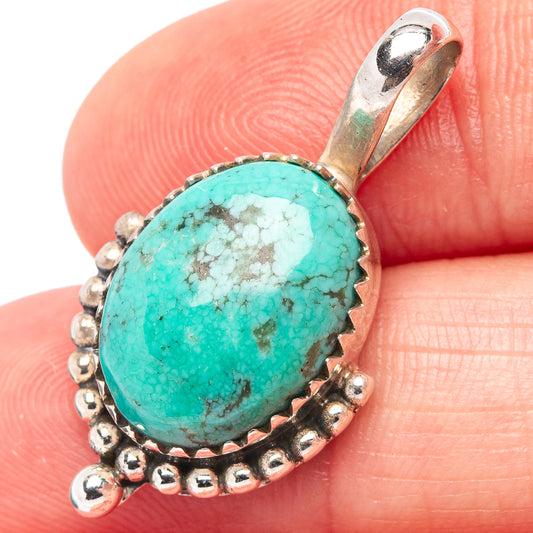 Turquoise oval pendant on .925 sterling silver with bead border and teardrop bail