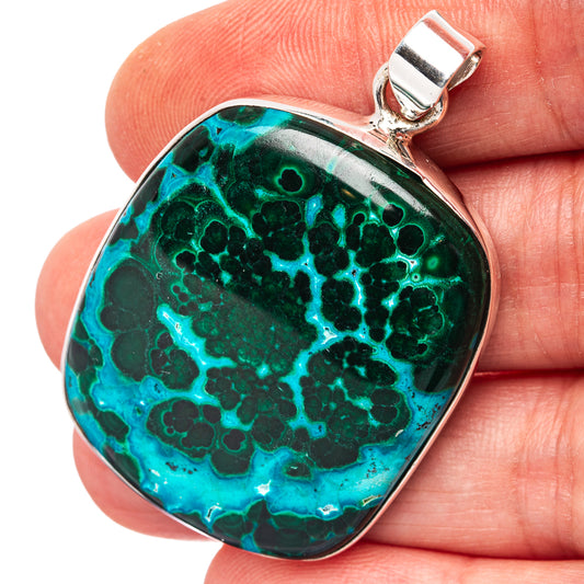 Oval malachite-and-chrysocolla pendant in sterling silver, blue-green cabochon