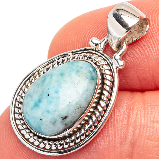Larimar oval pendant close-up, .925 sterling silver filigree bezel and top loop