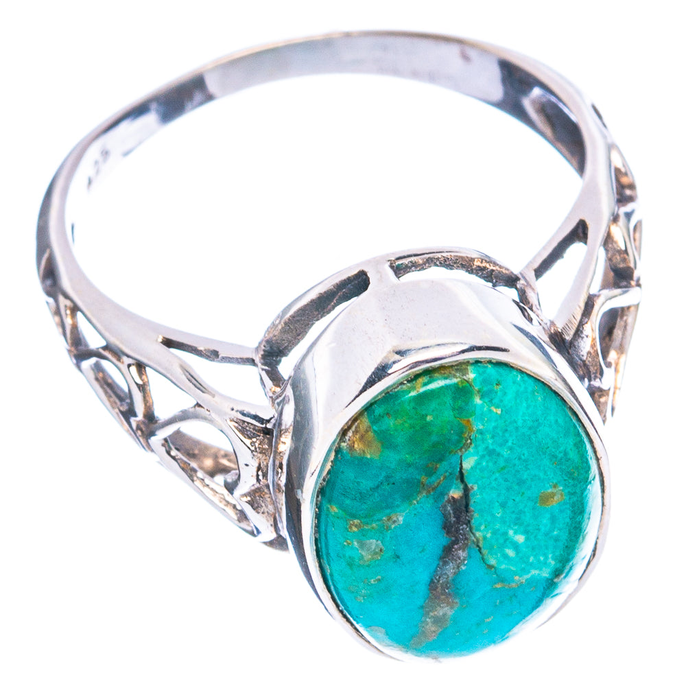 Sterling silver ring with round turquoise cabochon and ornate openwork band