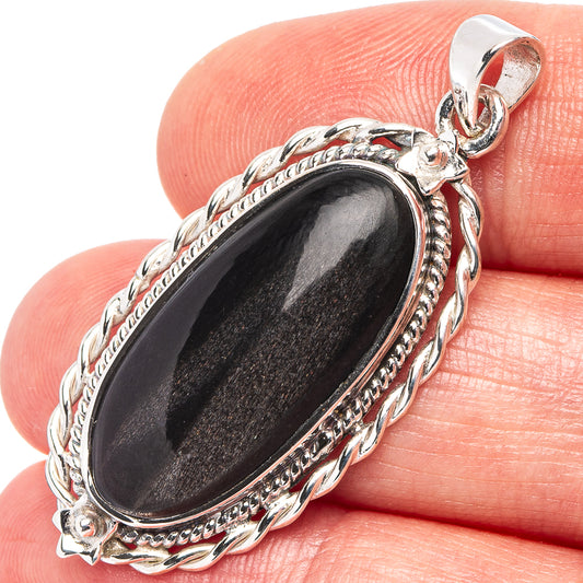 Obsidian pendant in .925 sterling silver with ornate oval bezel and top bail