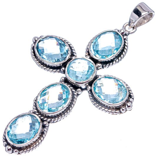 Sterling silver cross pendant with five round blue topaz gemstones and loop bail