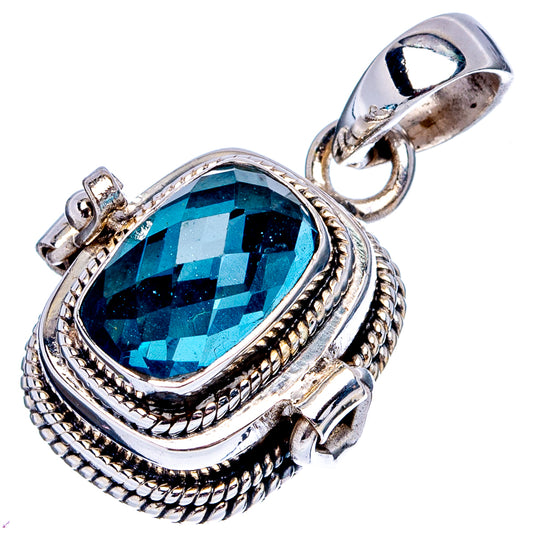 Sterling silver oval pendant with faceted blue gemstone and attached bail loop