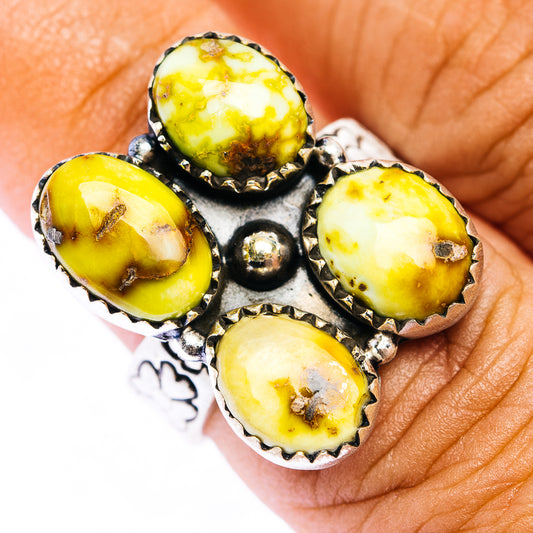Sterling silver ring with four dark yellow oval cabochons and scalloped bezels