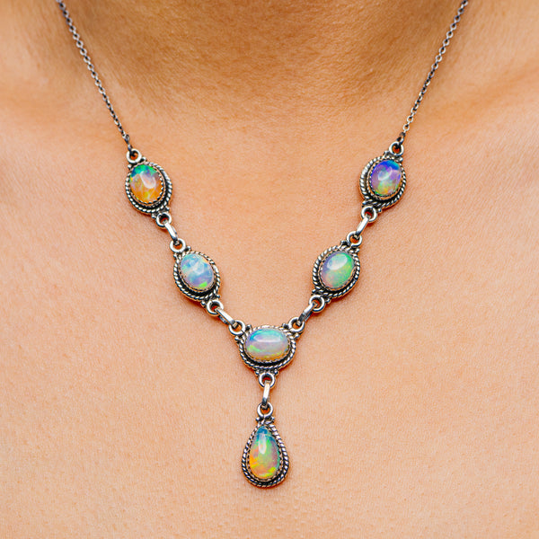 Sterling silver opal necklace with five teardrop gemstones and link chain
