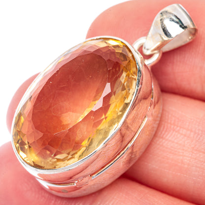 Faceted oval citrine pendant with 925 sterling silver bezel and bail