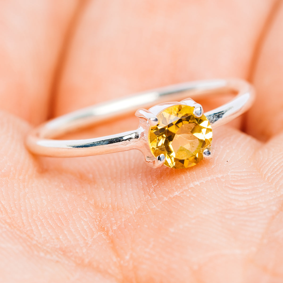 Citrine round gemstone stackable ring in .925 sterling silver, side view prongs
