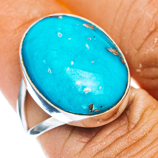 Turquoise oval ring with .925 sterling silver band, close-up