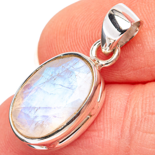 Rainbow moonstone pendant in .925 sterling silver with oval bezel and bail.
