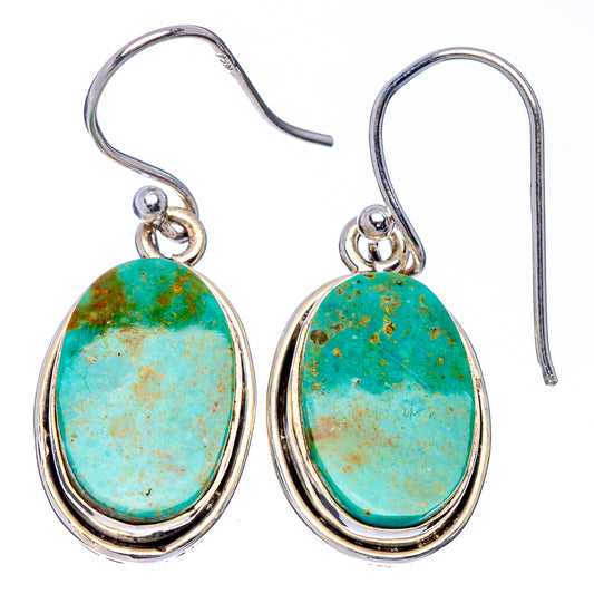 Pair of turquoise oval sterling silver hook earrings with layered bezel design