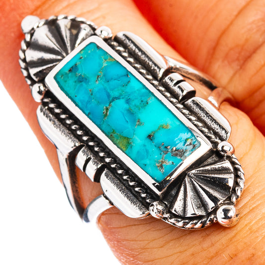 Sterling silver turquoise statement ring with rectangular cabochon and ornate shoulders
