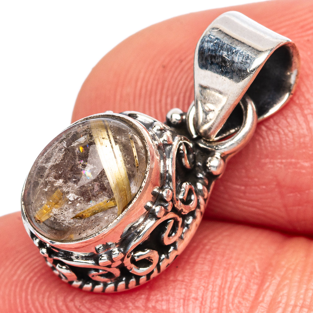 Oval rutilated quartz pendant in ornate 925 sterling silver bezel and bail
