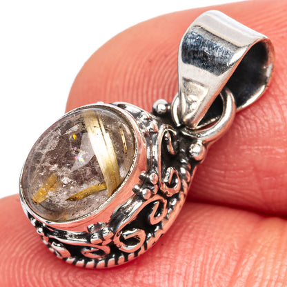 Oval rutilated quartz pendant in ornate 925 sterling silver bezel and bail