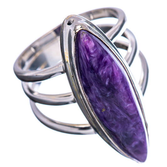 Sterling silver ring with purple teardrop charoite stone in raised bezel