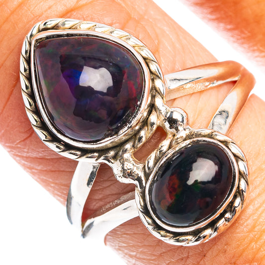 Black opal double-stone ring, oval cabochon in .925 sterling silver band