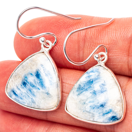 Blue scheelite earrings with silver hook backs and triangular teardrop stones, .925 sterling silver.