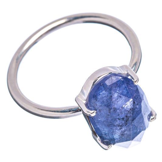Sterling silver ring with faceted cushion-oval blue gemstone and four prongs