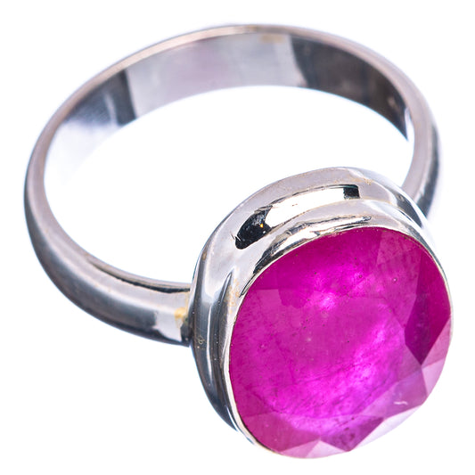 Ruby-color faceted glass ring with arched .925 sterling silver band, side view